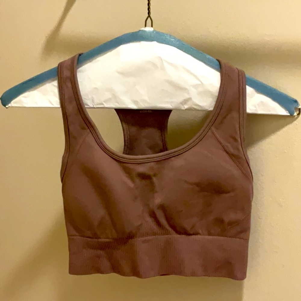 This set is a brown sports bra and brown leggings.